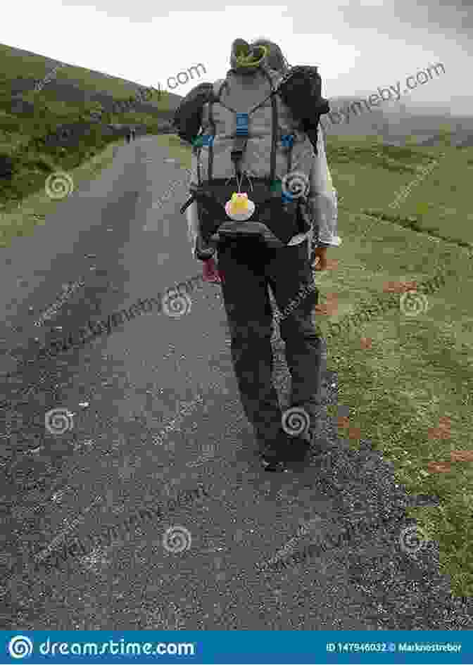 A Determined Pilgrim Walking Through A Rugged Landscape Sinning Across Spain: Walking The Camino