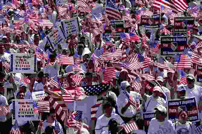 A Man Standing In Front Of A Crowd, Holding A Flag And Leading A Protest They Made Me An Outlaw : That S When I Became A Freedom Fighter