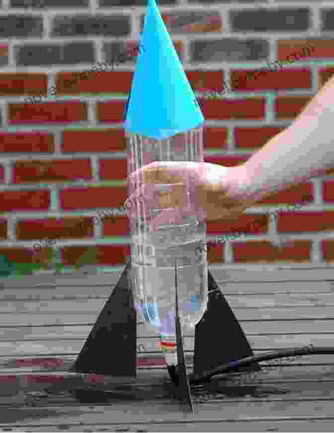 Child Building A Model Rocket Top 21 Science Experiments For Kids: Learn Engage And Have Fun With These Great Science Projects For Children In Elementary And Junior High