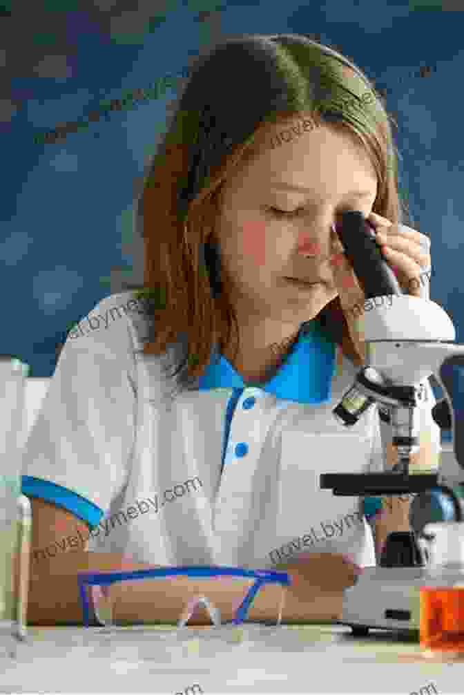 Close Up Of A Child Looking Through A Microscope Top 21 Science Experiments For Kids: Learn Engage And Have Fun With These Great Science Projects For Children In Elementary And Junior High