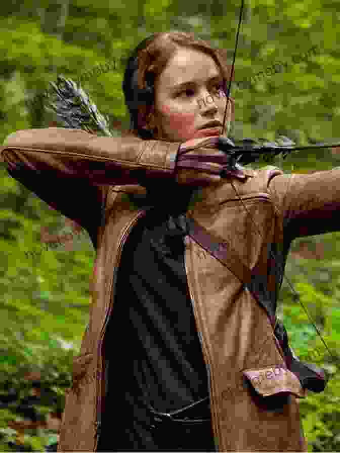 Katniss Everdeen, The Strong And Resourceful Protagonist, Wields A Bow And Arrow With Unwavering Accuracy The Panem Companion: An Unofficial Guide To Suzanne Collins Hunger Games From Mellark Bakery To Mockingjays